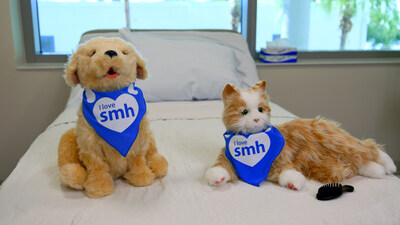 In the randomized trial, half of the older patients with mild to moderate dementia eligible to participate selected either a cat or a dog to interact with throughout their hospital stay. The interactive pets move and make sounds when touched—for example, the cat blinks, meows, and purrs, while the dog blinks, barks, and wags its tail.