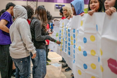 6th graders at Illahee Middle School in Washington join in an activity to find common ground for No One Eats Alone day