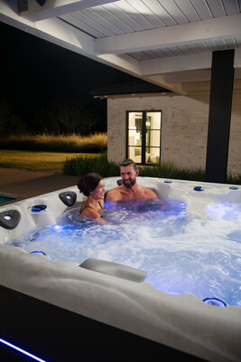 Michael and Nicole Phelps relax in the LSX 30 hot tub.