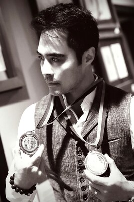 Sir Daniel K. Winn wearing the Mondial Art Academia Gold and Silver Medals.