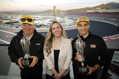 2025 Indy 500 winner Alex Palou and team owner Chip Ganassi are presented with their Baby Borg-Warner Trophies by Michelle Collins BorgWarner Global Director - Marketing and Public Relations