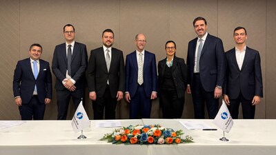 Representatives from Fortis Energy Renewable BV and the European Bank for Reconstruction and Development (EBRD) gather for a commemorative group photo following the official signing ceremony.