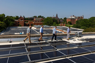 A solar array atop a Gallaudet University building generates clean energy that feeds into the local grid and helps provide electricity for residents and neighboring businesses. It also provides power for much of the campus;
 in an outage, energy stored in batteries could provide electricity for the whole college. Photo credit: The Pew Charitable Trusts.