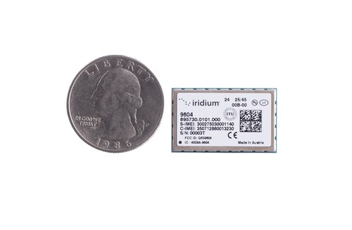 The Iridium 9604 three-in-one module. Quarter and module to scale.