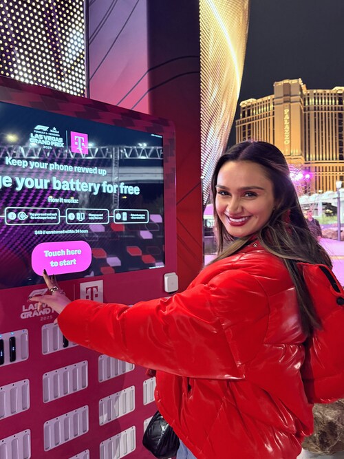 Guest renting a complimentary chargeFUZE portable charger through T-Mobile at the Formula 1 Las Vegas 2025.