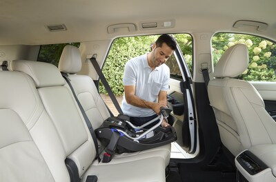 STAYTIGHT INSTALLATION: Simply lift the StayTight lever, thread and buckle the seat belt, and lower the lever to lock in place.