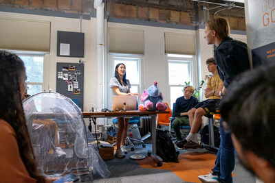 A participant in the Prototyping Hardware Accelerator presents her working prototype during a hardware sprint, where teams share updates and showcase the progress they've made throughout the program.