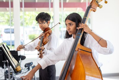 Stratford School students practicing music.