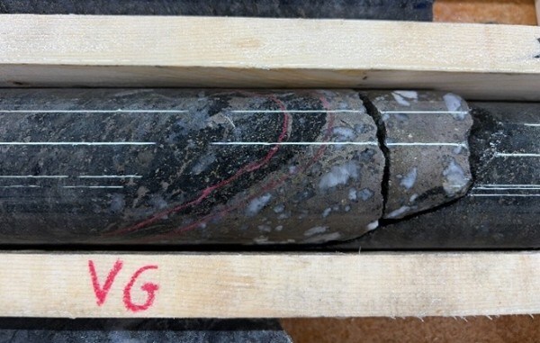 Figure 2: Drillhole photograph taken of drillhole PAL0406 from the Palokas Au-Co zone of mineralization from Rajapalot, where visible gold is observed at 111m downhole depth. Gold grains have formed alongside the salvages of a pyrrhotite-quartz vein. (CNW Group/Goldsky Resources Corp.) Figure 2: Drillhole photograph taken of drillhole PAL0406 from the Palokas Au-Co zone of mineralization from Rajapalot, where visible gold is observed at 111m downhole depth. Gold grains have formed alongside the salvages of a pyrrhotite-quartz vein. (CNW Group/Goldsky Resources Corp.)