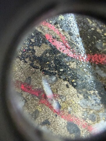 Figure 2: Drillhole photograph taken of drillhole PAL0406 from the Palokas Au-Co zone of mineralization from Rajapalot, where visible gold is observed at 111m downhole depth. Gold grains have formed alongside the salvages of a pyrrhotite-quartz vein. (CNW Group/Goldsky Resources Corp.) Figure 2: Drillhole photograph taken of drillhole PAL0406 from the Palokas Au-Co zone of mineralization from Rajapalot, where visible gold is observed at 111m downhole depth. Gold grains have formed alongside the salvages of a pyrrhotite-quartz vein. (CNW Group/Goldsky Resources Corp.)