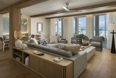 Inside one of six Treasure Beach CrystalSky 4-Bedroom Reserve Villas. The living room features an airy, open-plan design, with refined finishes and views of its beachfront setting.