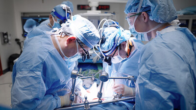 Transplant surgeon Dr. Cal Matsumoto and team perform surgery