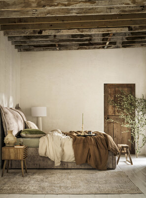 Rustic minimalist bedroom style and bed from Furniture Village.