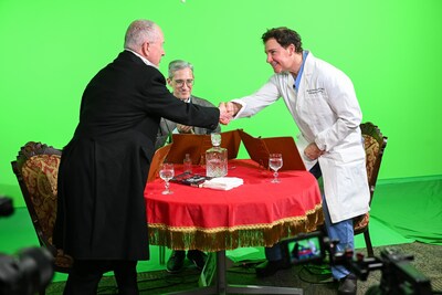 Actor Jim Hart (left) as Dr. Joseph Lister greets Mercy Medical Center orthopedic surgeon Dr. Joseph Ciotola, moderator Dan Collins (center). Actor Jim Hart (left) as Dr. Joseph Lister greets Mercy Medical Center orthopedic surgeon Dr. Joseph Ciotola, moderator Dan Collins (center).
