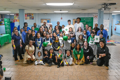 Celtics players Hugo Gonzalez, Derrick White and Amari Williams at Sun Life and Boston Celtics Fit to Win event with East Boston YMCA youth and staff and Sun Life executives and volunteers.
