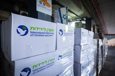 The International Fellowship of Christians and Jews partnered with Eshel Chabad Food Bank to pack thousands of food packages in preparation for war with Iran. Photo Credit: Elad Zagman/IFCJ