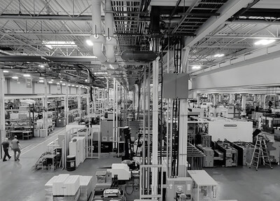 A view of the production floor where specialized molding cells have been dedicated to the American Plastic Toys portfolio. (CNW Group/Amara Industries)