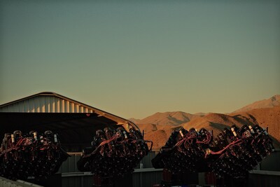 Part of the MOTHRA telescope array at sunset at El Sauce Observatory in Chile. Several mounts of the partially completed array are visible in the observatory building. Each mount carries 38 high-end Canon telephoto lenses equipped with specialized filters used to detect the extremely faint light of the cosmic web. Once complete, the telescope will consist of 30 mounts working together as a single instrument. Part of the MOTHRA telescope array at sunset at El Sauce Observatory in Chile. Several mounts of the partially completed array are visible in the observatory building. Each mount carries 38 high-end Canon telephoto lenses equipped with specialized filters used to detect the extremely faint light of the cosmic web. Once complete, the telescope will consist of 30 mounts working together as a single instrument.