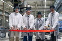 Inauguration of the new production line at the Toblerone plant in Bern Brünnen. From left to right: Thomas Kauffmann (Plant Manager, Toblerone Plant Bern Brünnen), Guy Parmelin (Swiss Federal President), Marieke Kruit (Mayor of Bern), and Volker Kuhn (Executive Vice President & President, Mondelez Europe).