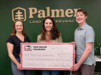 Palmer Land Conservancy, represented by Donor Relations Manager Astrid Monar, accepts the donation on March 9th