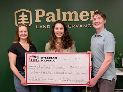 Palmer Land Conservancy, represented by Donor Relations Manager Astrid Monar, accepts the donation on March 9th