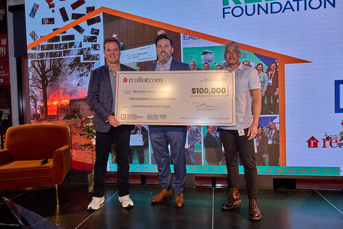 Realtor.com® CEO Damian Eales and Chief Consumer & Marketing Officer Mickey Neuberger present a $100,000 contribution to the REALTORS® Relief Foundation and its Immediate Past President Mike McGrew.