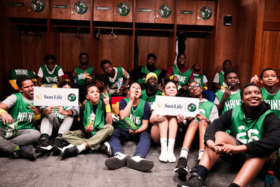 Middle schoolers from Boys and Girls Clubs of Southern Maine gather in the Celtics locker room at the Portland Expo to experience a Middle schoolers from Boys and Girls Clubs of Southern Maine gather in the Celtics locker room at the Portland Expo to experience a