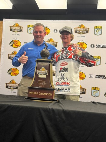 Caymas Boats President Adam Adkisson congratulates 2026 Bassmaster Classic Champion Dylan Nutt after his historic victory fishing from a Caymas CX 21 Pro.