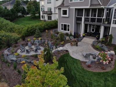 Spear's Landscape outdoor living project including a patio, firepit, and high-end landscaping