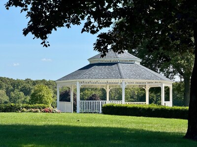 Tucked among the rolling hills and ancient trees of Christ the King Cemetery in Franklin Lakes, New Jersey, this elegant gazebo offers families a tranquil and intimate setting for committal services and quiet reflection - a timeless sanctuary where faith, nature, and remembrance meet. Tucked among the rolling hills and ancient trees of Christ the King Cemetery in Franklin Lakes, New Jersey, this elegant gazebo offers families a tranquil and intimate setting for committal services and quiet reflection - a timeless sanctuary where faith, nature, and remembrance meet.