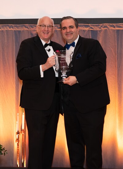 Todd Raymond, executive director of Cabot Park Village, accepts the 2025 Peter Small Award for Fulfilling Our Purpose