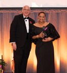Patricia Jacques, lead aid at The Atrium at Faxon Woods, accepts Benchmark’s 2025 Service Champion Award for Transforming Lives Through Human Connection