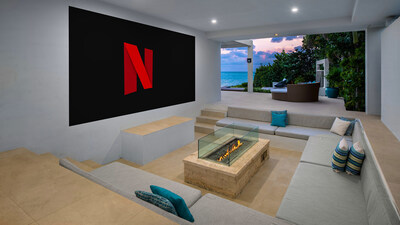 A covered, outdoor theater is one of Triton’s many outdoor living amenities. The theater features a custom projection screen, surround-sound, built-in, “sunken” seating and a central firepit. TritonLuxuryAuction.com.