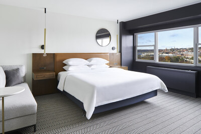 King bed guest room with a beautiful view of Washington, DC.