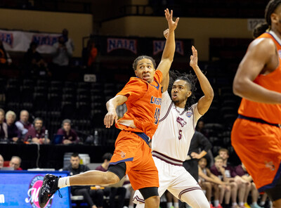 FHU Lion Blake Dean (No. 5) goes for a shot in the NAIA championship game Tuesday, March 24, 2026.