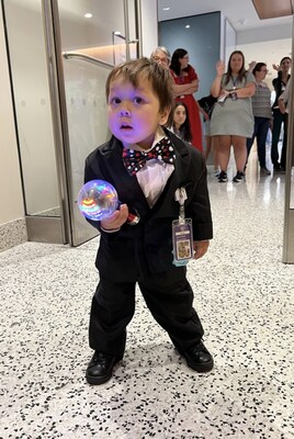 Wyatt, dressed in a tuxedo, prepares to parade through the halls of Hassenfeld Children’s Hospital on the day he went home.