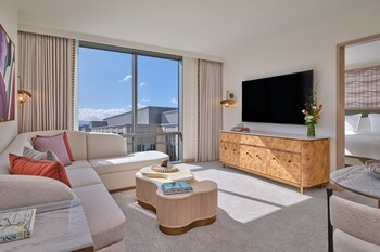 Deluxe One Bedroom Suite bedroom- Living Room