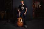 Ben Harper with his Taylor Guitars Ben Harper Gold Label 512e Special Edition