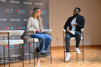 Lexie Hull, WNBA free agent and NCAA Division I women's basketball champion, speaks with Johnny Milabu, Corporate Marketing Manager at LG Electronics USA, during a mental health discussion for IU Indianapolis student-athletes at the 2026 NCAA Men's Final Four. Pictured (from l to r): Lexie Hull; Johnny Milabu.
