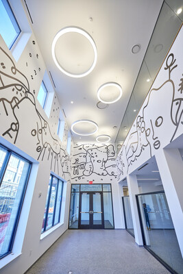 Inspirational art mural by renowned artist Shantell Martin, displayed in entry of HELP USA women's shelter.