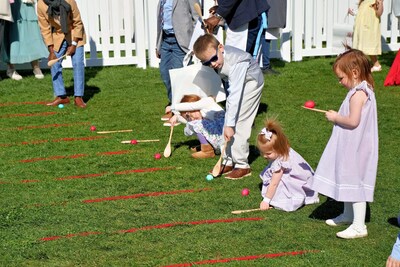 Children roll real dyed eggs donated by America’s egg farmers at the 2026 White House Easter Egg Roll. Source: American Egg Board.