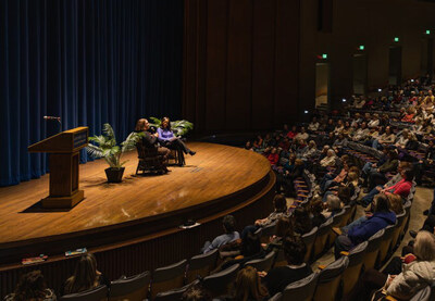 An author speaks to a full audience during a public program supported by the Foundation for Baltimore County Public Library, which will host a series of community events, author visits, and a culminating lecture at Goucher College.