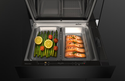 The new Miele steam drawer, when combined with a 45 cm compact oven with microwave in a 60 cm niche, forms a space-saving 3-in-1 solution for baking, reheating and steam cooking, with two separate steam cooking containers for preparing different food at the same time. Coming March 2027. (Photo: Miele)