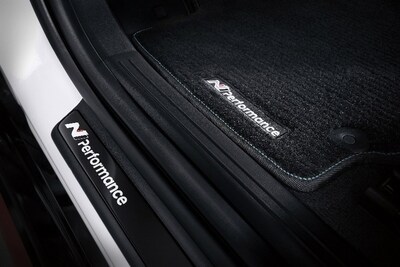 Hyundai N Performance Parts (IONIQ 5 N door scuff plates/floor mats) are depicted. Hyundai N Performance Parts (IONIQ 5 N door scuff plates/floor mats) are depicted.