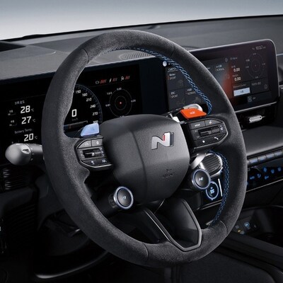 Hyundai N Performance Parts (IONIQ 5 N Alcantara® steering wheel) is depicted. Hyundai N Performance Parts (IONIQ 5 N Alcantara® steering wheel) is depicted.