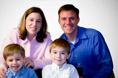 United States Army Major Paul C. Voelke with wife Traci along with sons Ben and AJ.