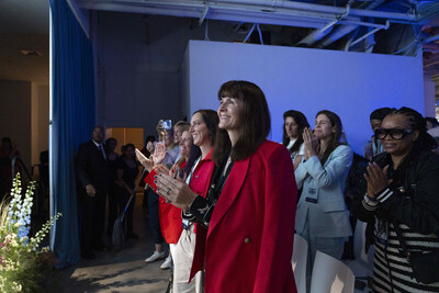 Audience celebrates as Andrea Brimmer, Ally Chief Marketing and Public Relations Officer, and iHeart’s Sarah Spain discuss achieving the 50/50 Pledge to hit equal spend across men’s and women’s sports media at Deep Blue Business of Women’s Sports Summit at Chelsea Industrial on Tuesday, April 14, 2026, in New York, New York. (Calla Kessler/AP Content Services for Ally)