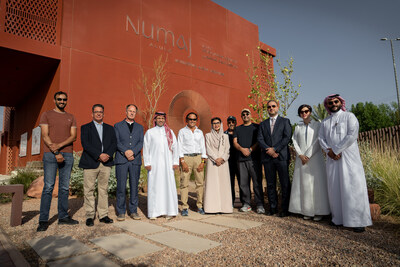 Group photo at the NUMAJ development site in AlUla