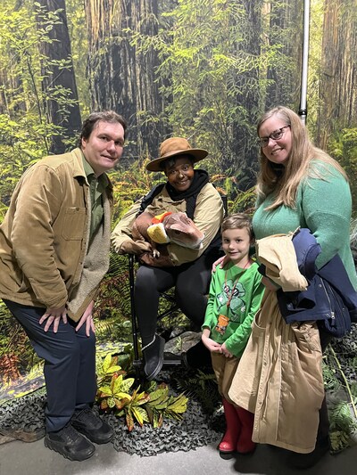 Gavin Roddy with his wife and son attending an educational event.