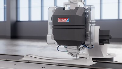 The solution developed by tesa and AUMOVIO can be fully automated and integrated into existing production lines. (PRNewsfoto/tesa SE)